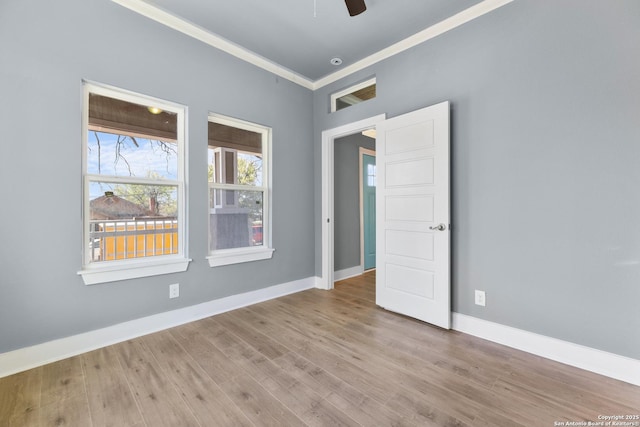 129 Cincinnati, San Antonio, TX 78201 - empty room featuring baseboards, ornamental molding, wood finished floors, and a ceiling fan