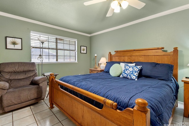 bedroom featuring light tile patterned flooring, crown molding, and a ceiling fan