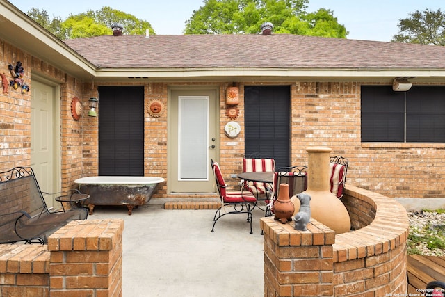 view of patio featuring outdoor dining area
