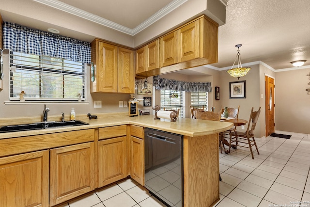kitchen with light countertops, light tile patterned floors, a sink, dishwashing machine, and a peninsula