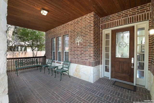 4630 Grass Fight, San Antonio, TX 78253 - property entrance featuring a porch and brick siding