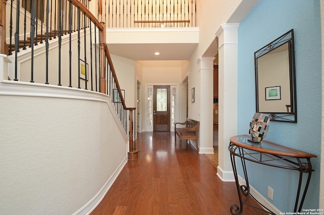 4630 Grass Fight, San Antonio, TX 78253 - entryway with stairs, a high ceiling, wood finished floors, baseboards, and ornate columns