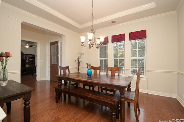 4630 Grass Fight, San Antonio, TX 78253 - dining space with visible vents, baseboards, ornamental molding, wood finished floors, and a tray ceiling