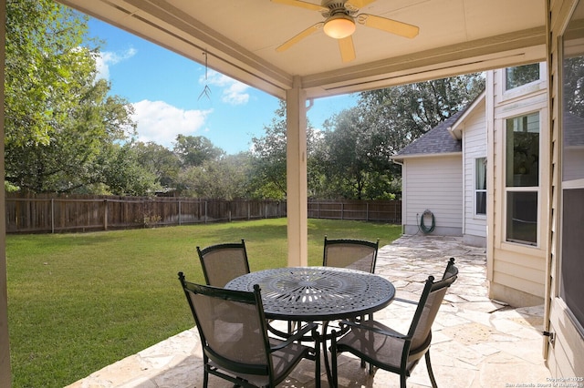 4630 Grass Fight, San Antonio, TX 78253 - view of patio / terrace featuring outdoor dining area, a fenced backyard, and a ceiling fan