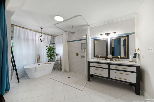 full bathroom with double vanity, a sink, tile patterned floors, and a tile shower