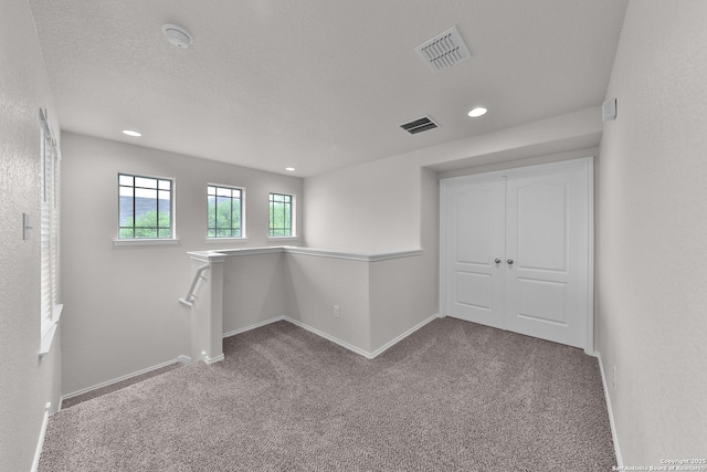 13612 Sungrove Vw, San Antonio, TX 78245 - empty room featuring baseboards, visible vents, and carpet
