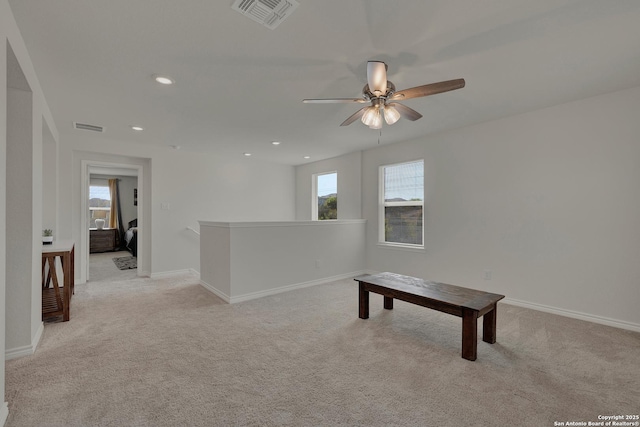 game room featuring visible vents, carpet, and a ceiling fan