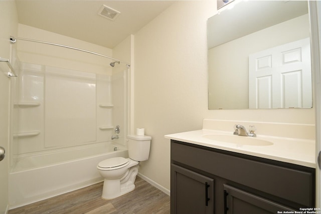 180 Elderberry, New Braunfels, TX 78130 - full bathroom with vanity, toilet, visible vents, shower / tub combination, and wood finished floors
