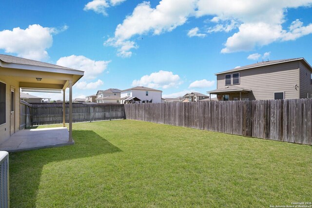 180 Elderberry, New Braunfels, TX 78130 - view of yard with a fenced backyard, a residential view, and a patio