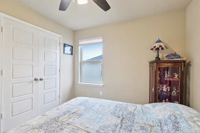 bedroom featuring a closet and ceiling fan