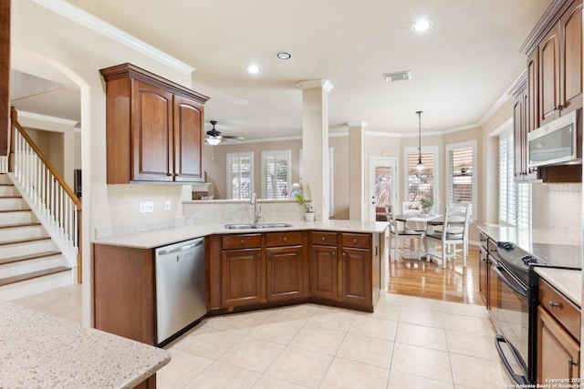 kitchen featuring a sink, a ceiling fan, stainless steel dishwasher, visible vents, and black electric range