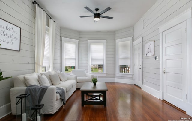 144 Ward Ave, San Antonio, TX 78223 - living room featuring baseboards, wood finished floors, and a ceiling fan