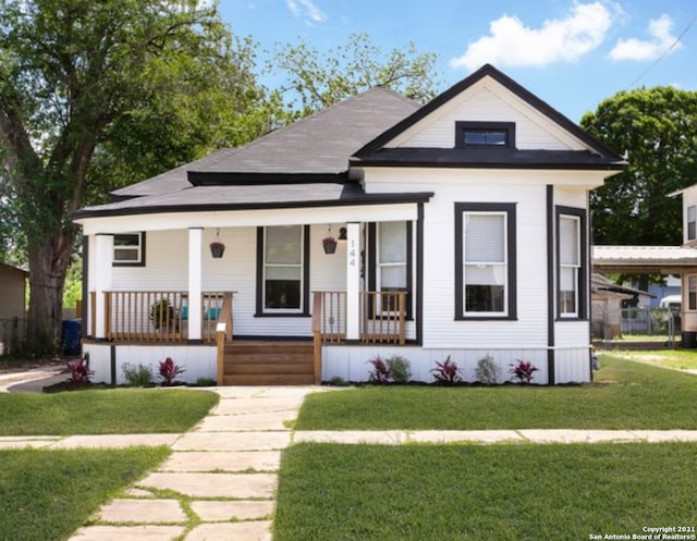 144 Ward Ave, San Antonio, TX 78223 - bungalow with a front yard and a porch