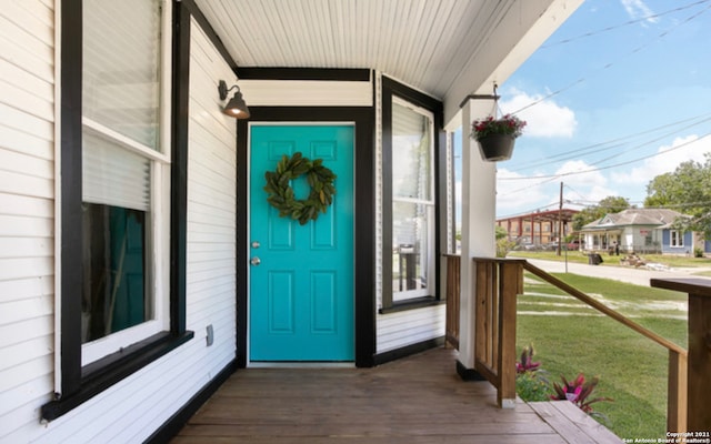 144 Ward Ave, San Antonio, TX 78223 - view of exterior entry with covered porch and a lawn
