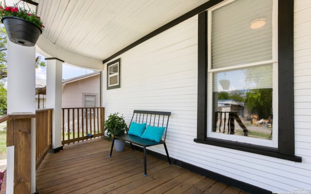 144 Ward Ave, San Antonio, TX 78223 - wooden terrace featuring covered porch