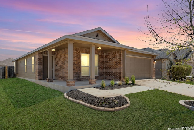 2297 Olive Hl, New Braunfels, TX 78130 - view of front of house with brick siding, a garage, and a front lawn