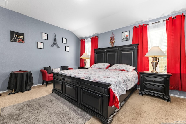 bedroom with baseboards, lofted ceiling, multiple windows, and light colored carpet