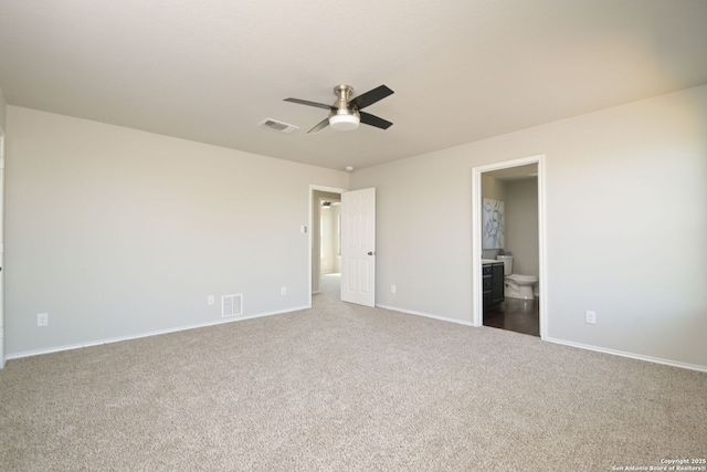 unfurnished bedroom with baseboards, visible vents, and carpet flooring