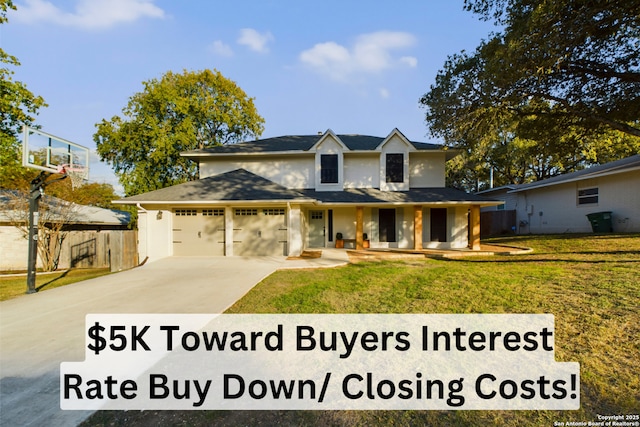 traditional home featuring fence, an attached garage, driveway, a front lawn, and covered porch
