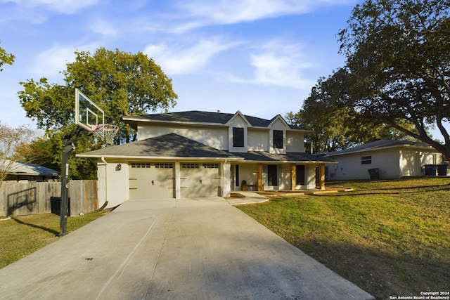 traditional-style house featuring fence, a garage, concrete driveway, a front lawn, and a porch