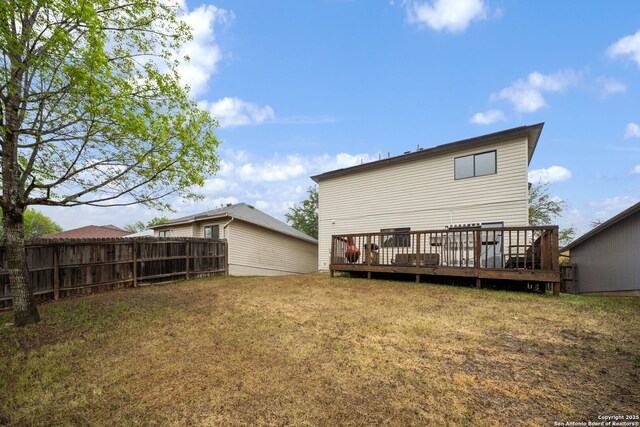 9911 Alexa Pl, San Antonio, TX 78251 - back of property with a lawn, a wooden deck, and fence