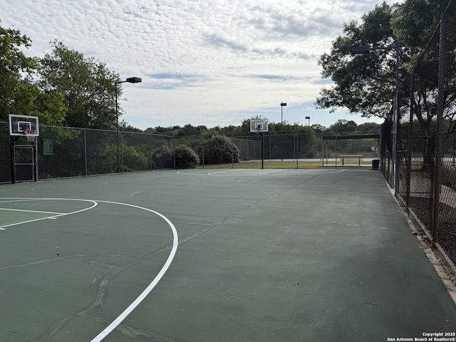 3402 Copper Pt, San Antonio, TX 78259 - view of basketball court featuring fence and community basketball court