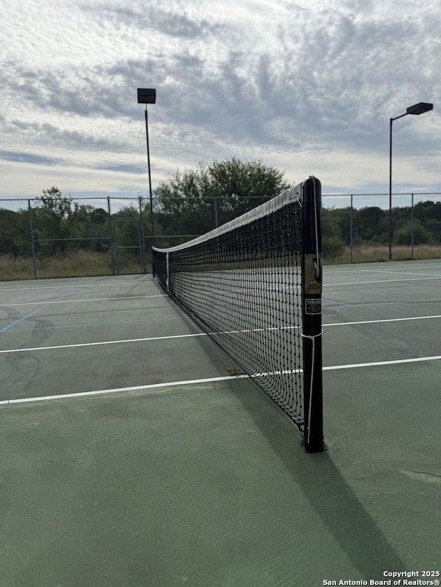 3402 Copper Pt, San Antonio, TX 78259 - view of tennis court featuring fence
