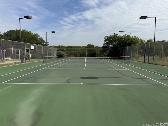 3402 Copper Pt, San Antonio, TX 78259 - view of tennis court with fence