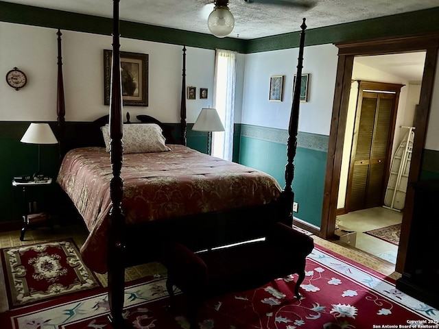 bedroom featuring a textured ceiling