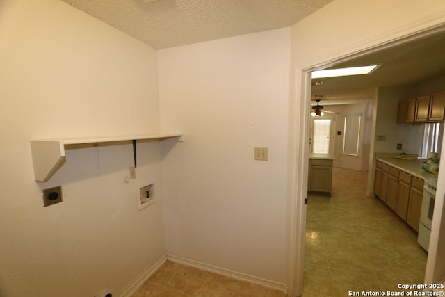 laundry area with hookup for an electric dryer, baseboards, a textured ceiling, ceiling fan, and washer hookup