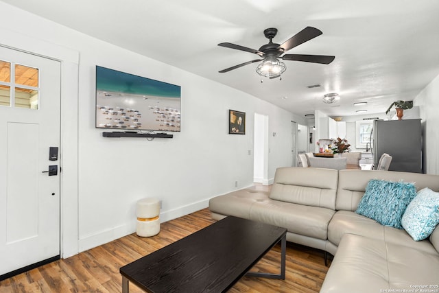 314 Trail, San Antonio, TX 78212 - living room featuring baseboards, visible vents, wood finished floors, and ceiling fan