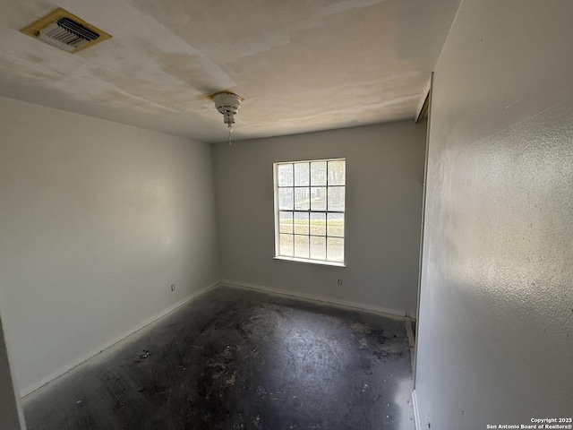 5119 Village Ct, San Antonio, TX 78218 - unfurnished room with unfinished concrete flooring, baseboards, and visible vents