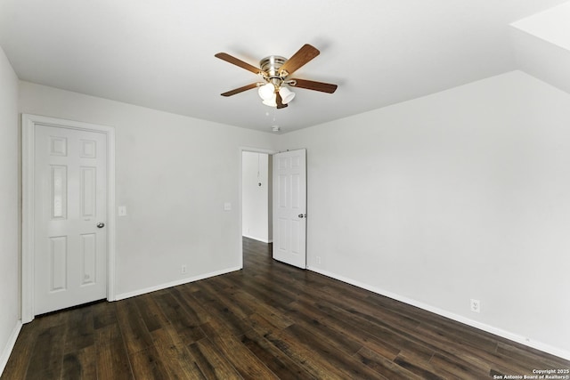 interior space featuring dark wood-style floors, baseboards, and ceiling fan