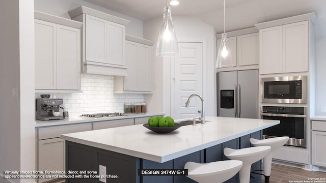 276 Haby Holw, San Antonio, TX 78253 - kitchen featuring a breakfast bar, light countertops, stainless steel appliances, and tasteful backsplash