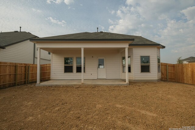 6003 Cienna Cv, San Antonio, TX 78222 - rear view of property with a patio area and a fenced backyard