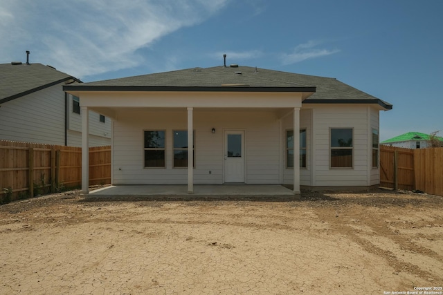 6003 Cienna Cv, San Antonio, TX 78222 - rear view of property featuring a patio area and a fenced backyard