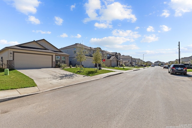view of street featuring curbs, a residential view, street lighting, and sidewalks