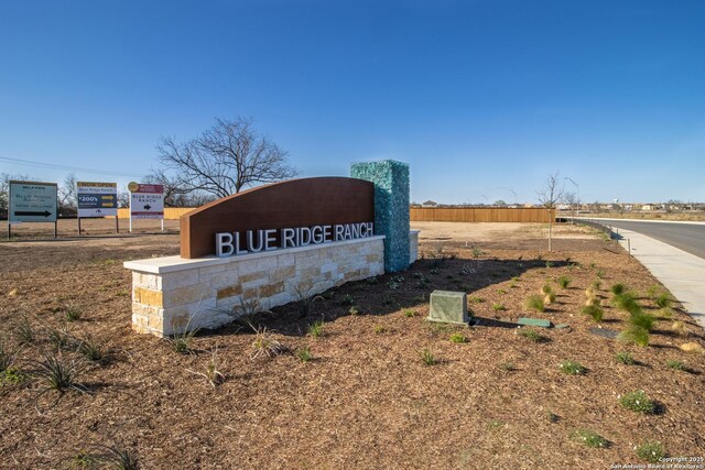 view of community sign