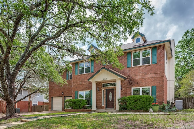 2312 Encino Xing, San Antonio, TX 78259 - view of front of house with fence, brick siding, and a garage