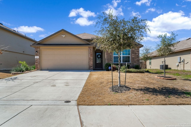ranch-style house with driveway, a garage, and brick siding