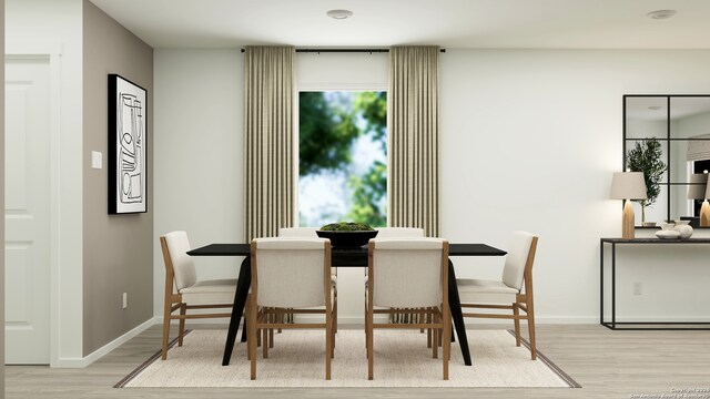 3726 Rock Mill Dm, San Antonio, TX 78245 - dining area featuring baseboards and light wood-style flooring