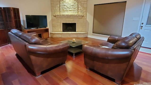 260 Campbell, Canyon Lake, TX 78133 - living room featuring a fireplace and wood finished floors