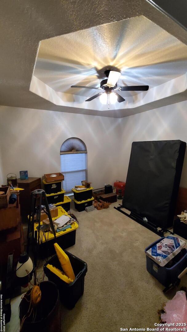 260 Campbell, Canyon Lake, TX 78133 - game room with carpet floors, a textured ceiling, and a ceiling fan