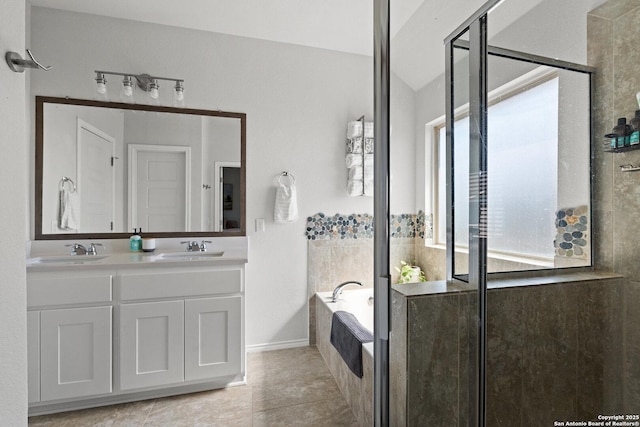 full bathroom featuring a bath, a sink, and a shower stall