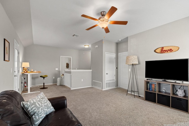 carpeted living area featuring a ceiling fan, baseboards, lofted ceiling, and visible vents
