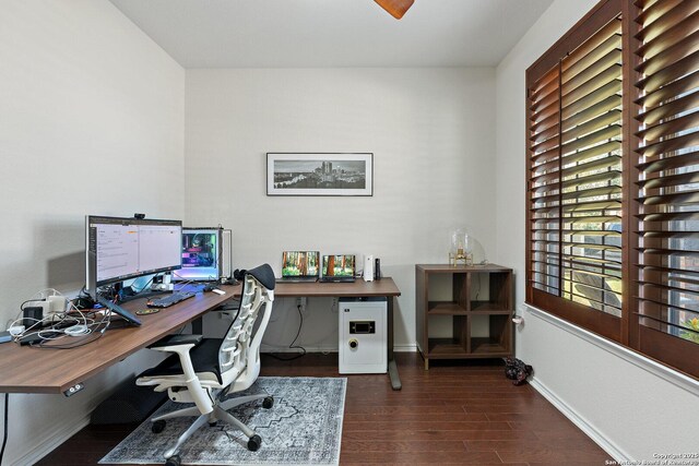 office featuring baseboards and dark wood-style floors