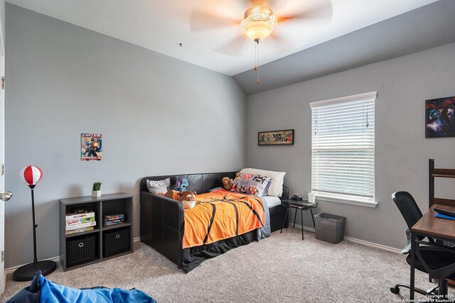bedroom featuring baseboards, lofted ceiling, ceiling fan, and carpet