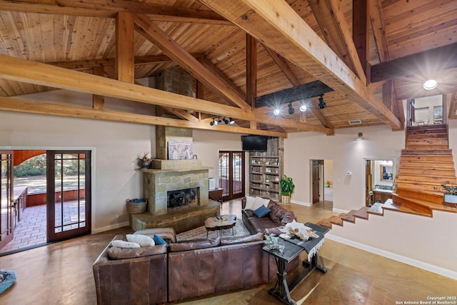 living room featuring stairway, wooden ceiling, beam ceiling, and high vaulted ceiling