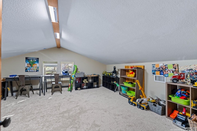rec room featuring lofted ceiling, carpet floors, and a textured ceiling