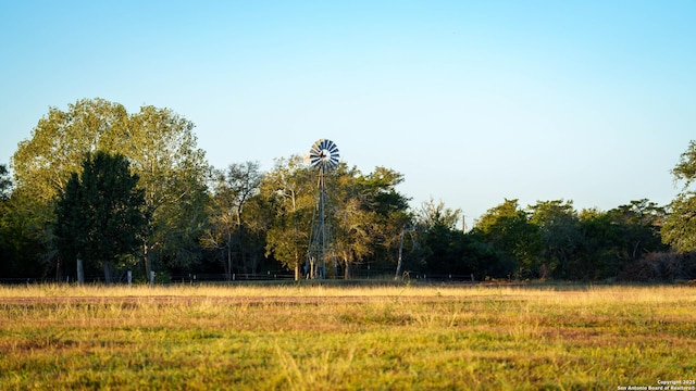 view of landscape with a forest view